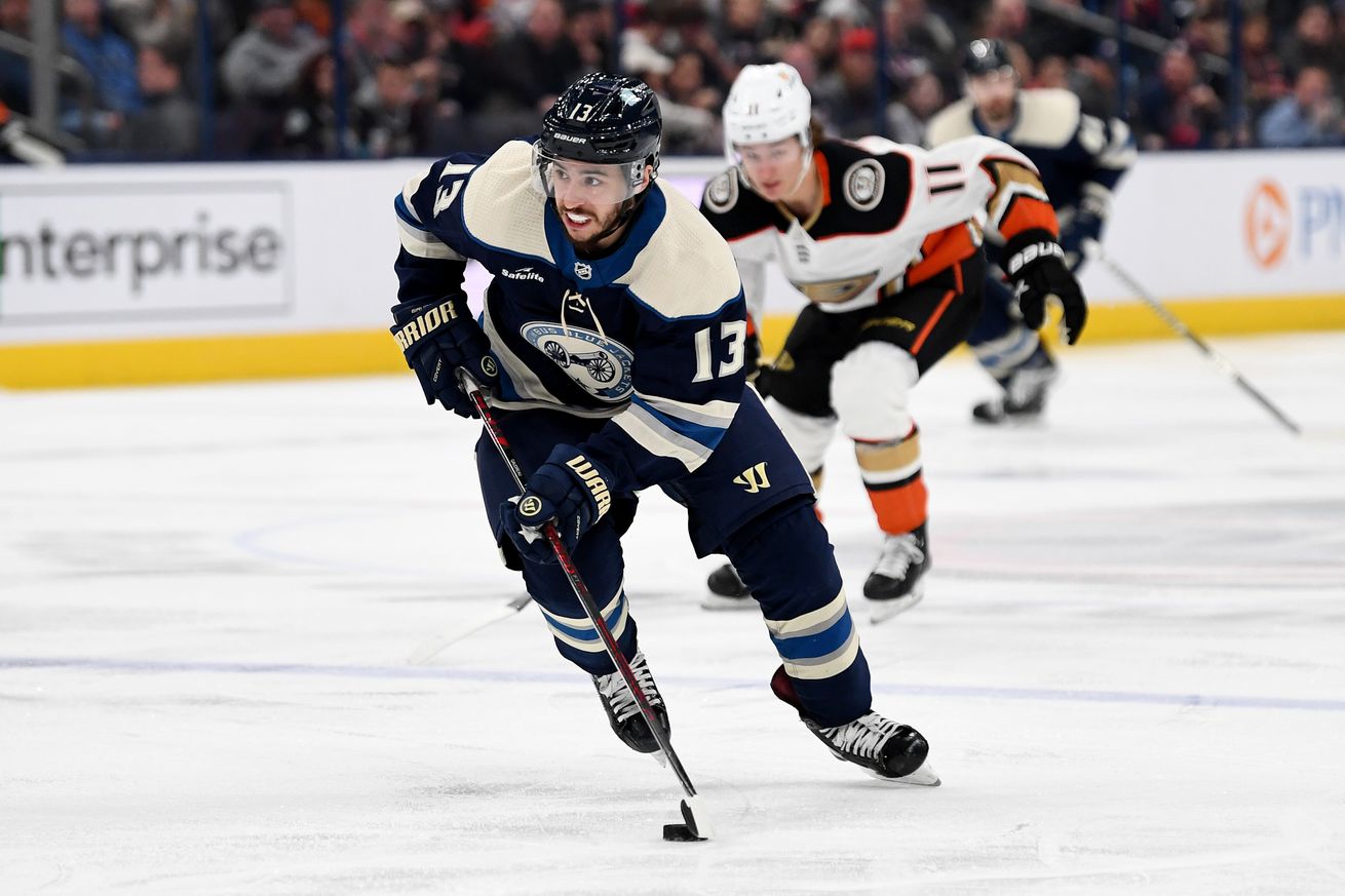 Johnny Gaudreau (13) of the Columbus Blue Jackets controls the puck during the second period against the Anaheim Ducks on January 19, 2023 at Nationwide Arena in Columbus, Ohio.