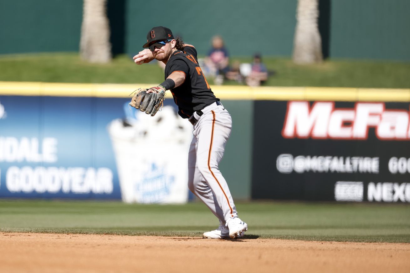 Brett Wisely making a throw the infield