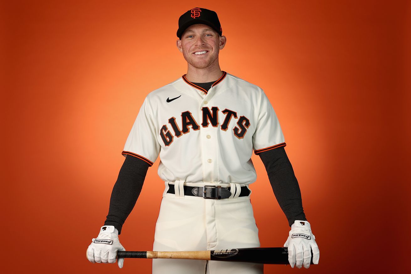 Vaun Brown holding a bat at media day