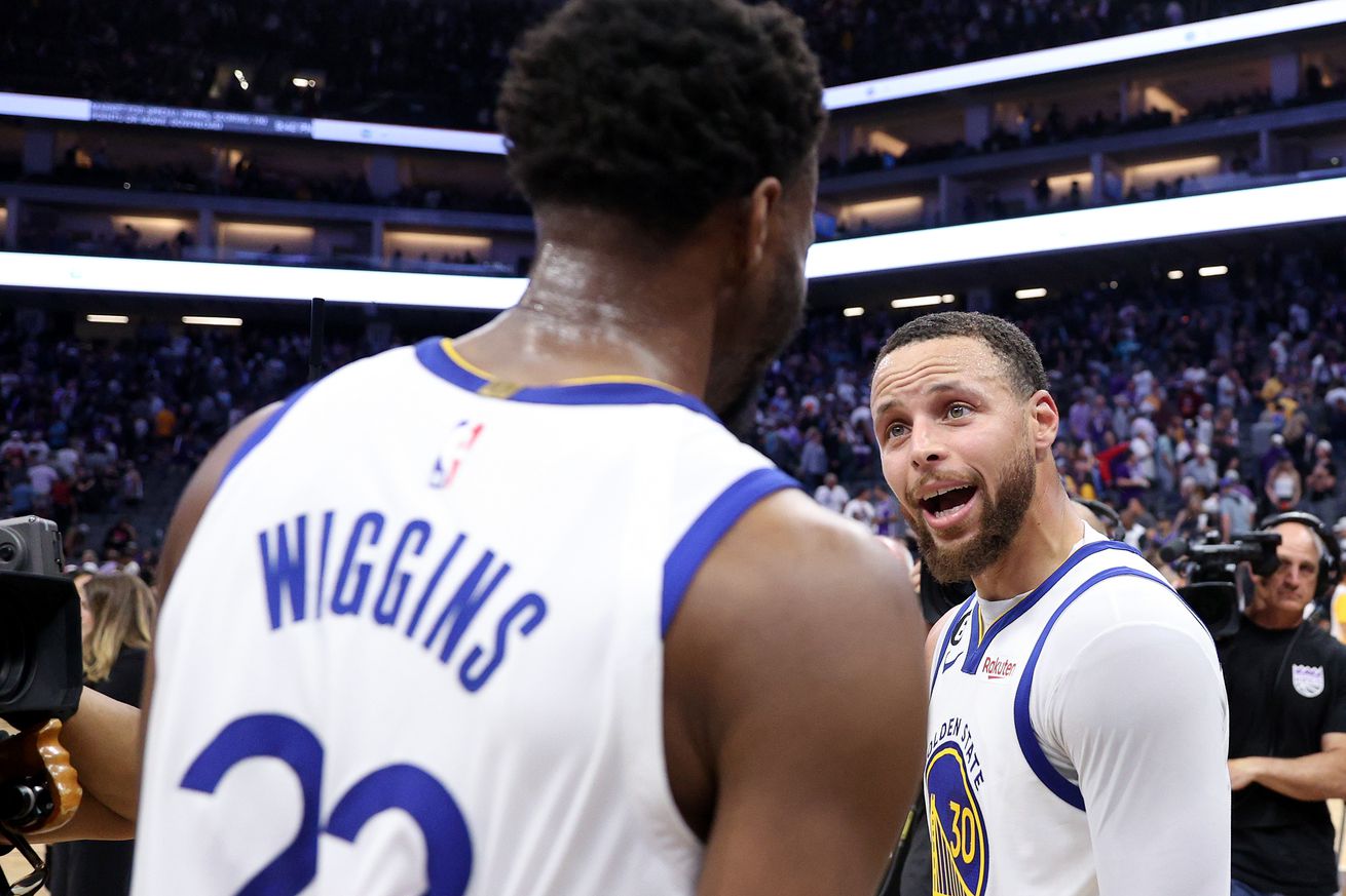 Steph Curry and Andrew Wiggins celebrating 