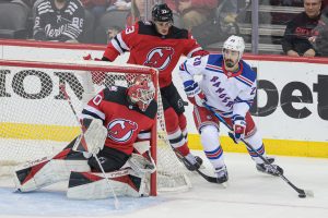 Devils goaltender Akira Schmid helps New Jersey guarantee the win.