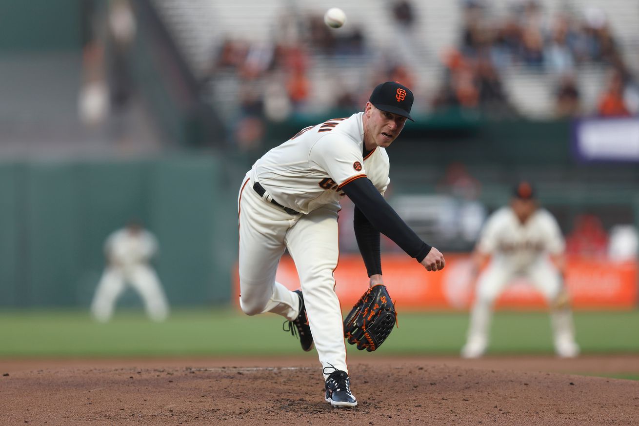 Anthony DeSclafani throwing a pitch