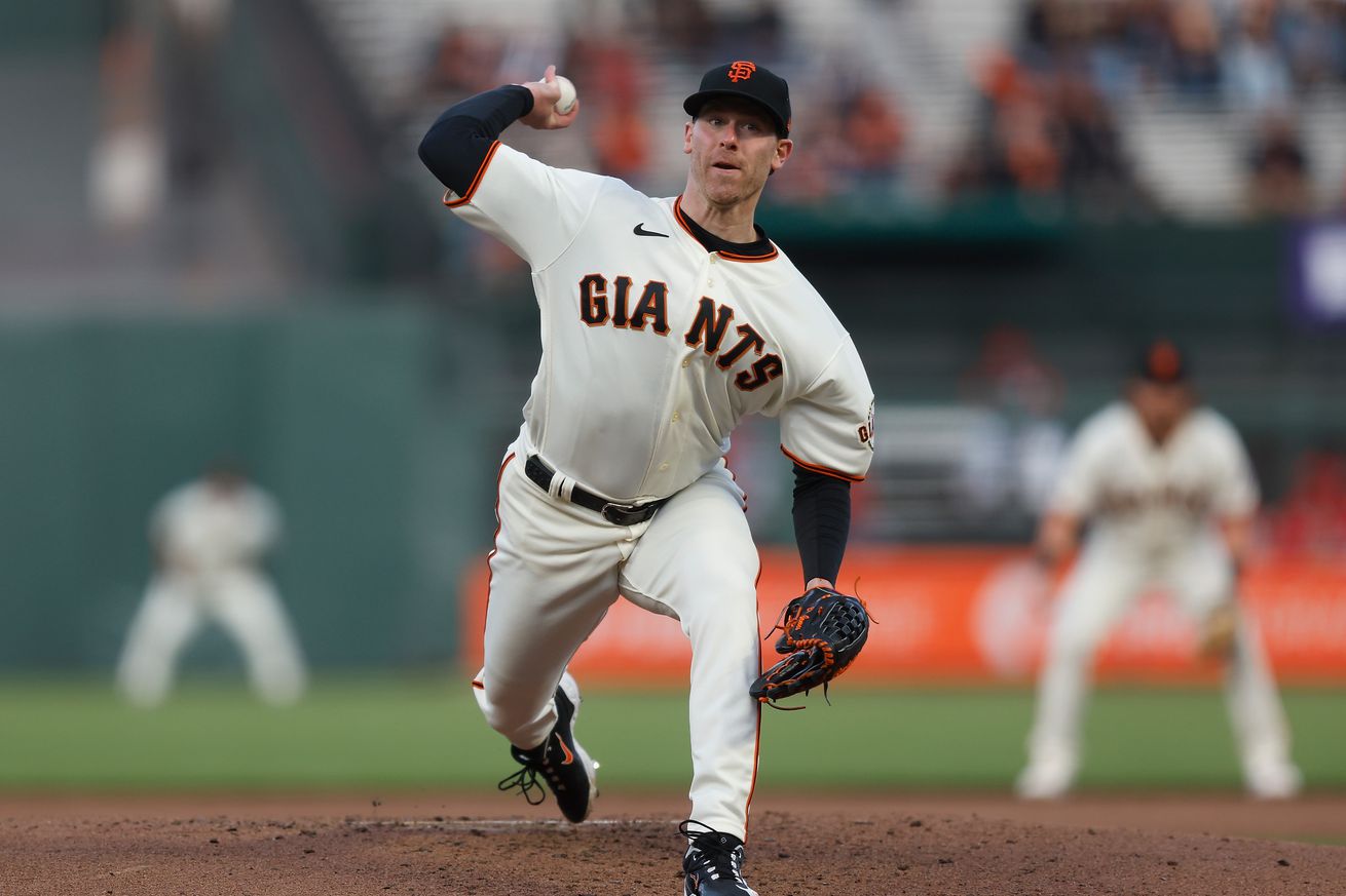 Anthony DeSclafani throwing a pitch