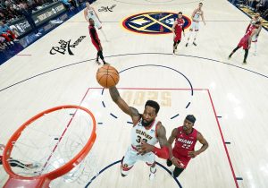 Jun 12, 2023; Denver, Colorado, USA; Denver Nuggets forward Jeff Green (32) shoots the ball against Miami Heat forward Jimmy Butler (22) during the first half in game five of the 2023 NBA Finals at Ball Arena. Mandatory Credit: Jack Dempsey/Pool Photo-USA TODAY Sports