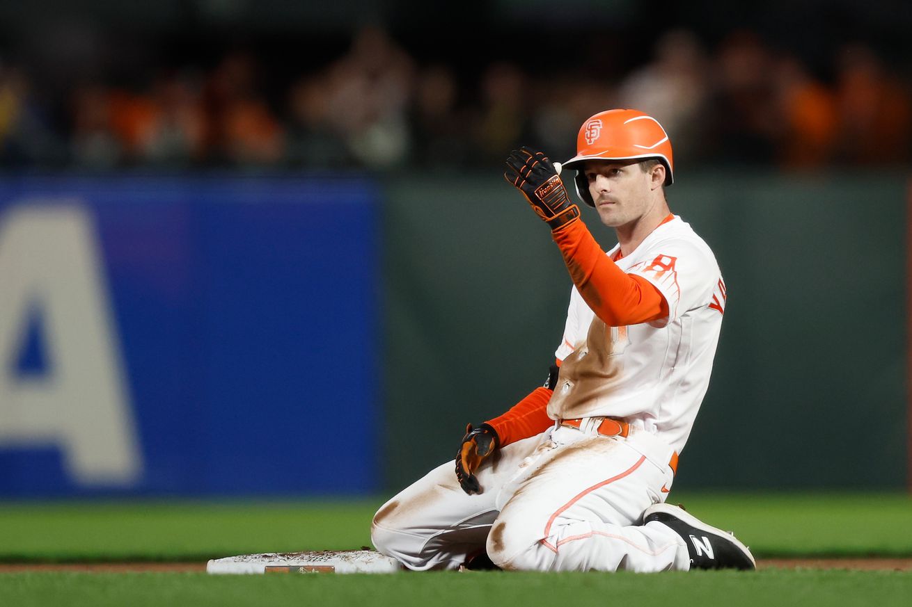 Mike Yastrzemski kneeling on second base