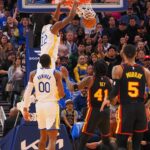 Golden State Warriors forward Andrew Wiggins (22) dunks the ball against the Atlanta Hawks during the second quarter at Chase Center.