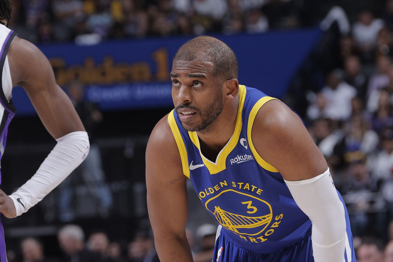 Chris Paul with his hands on his knees. 