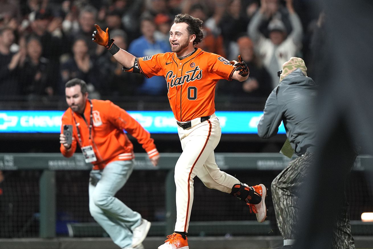 Brett Wisely running the bases after a walk-off home run. 