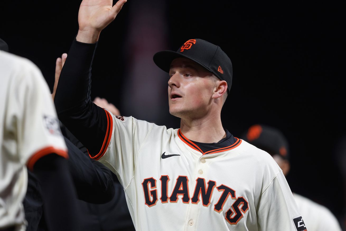 Matt Chapman high-fiving in the post-game line.