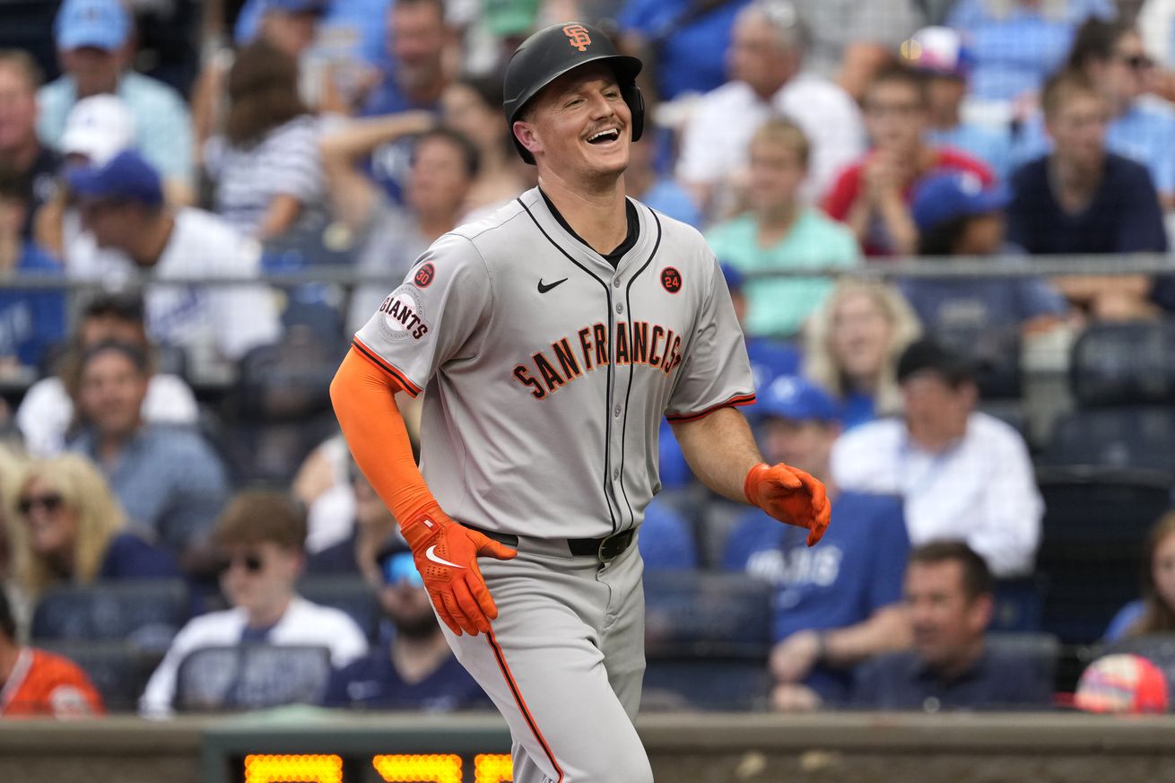 Matt Chapman smiling after a home run. 