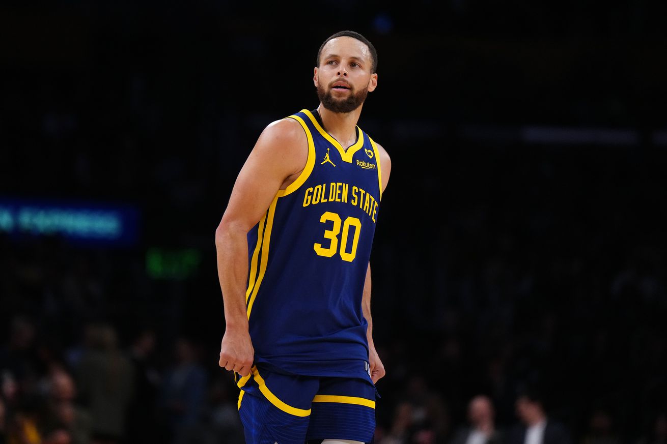 Close up of Steph Curry and his No. 30 jersey on the court. 