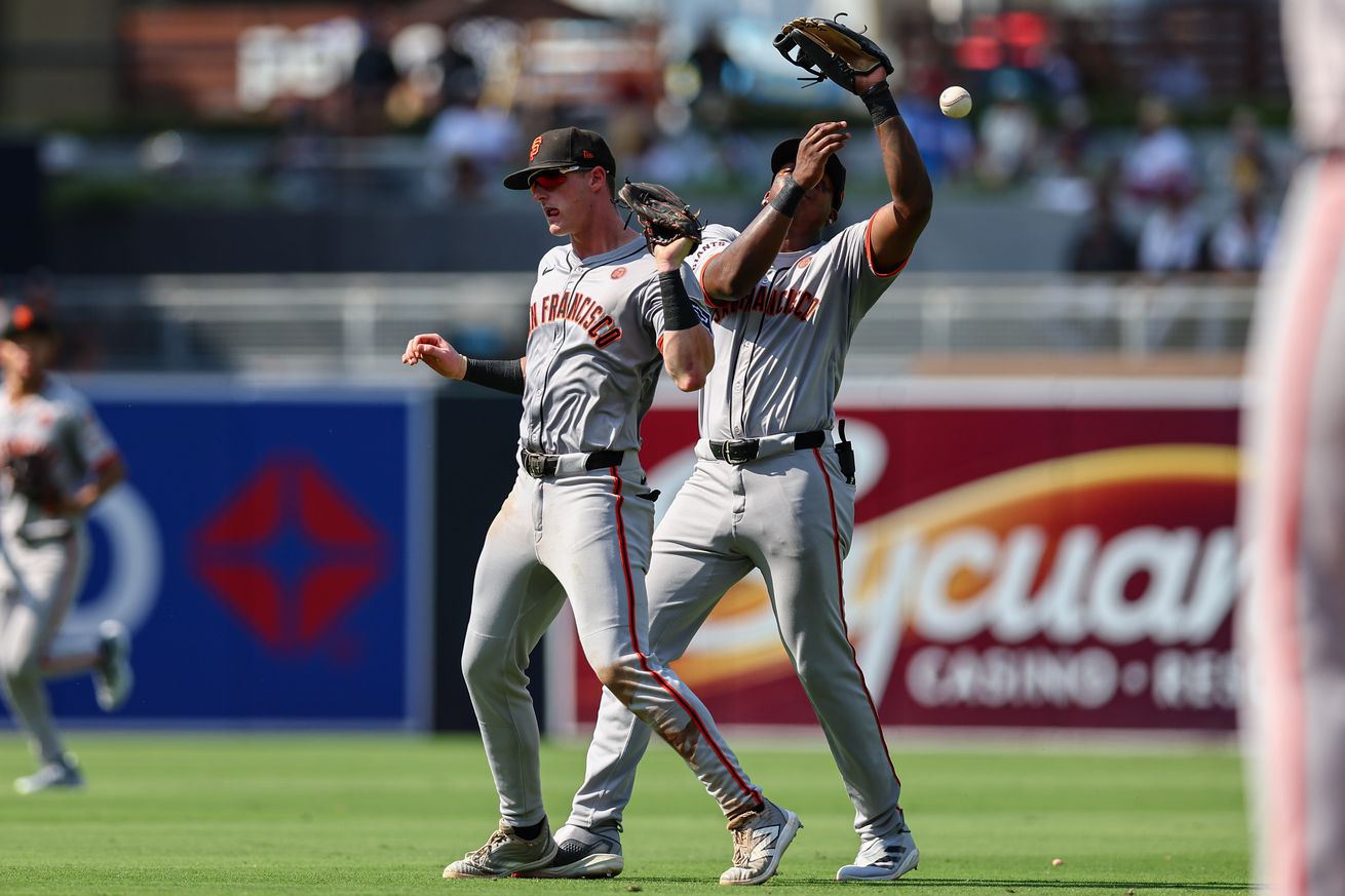 Marco Luciano and Tyler Fitzgerald colliding trying to catch a popup. 