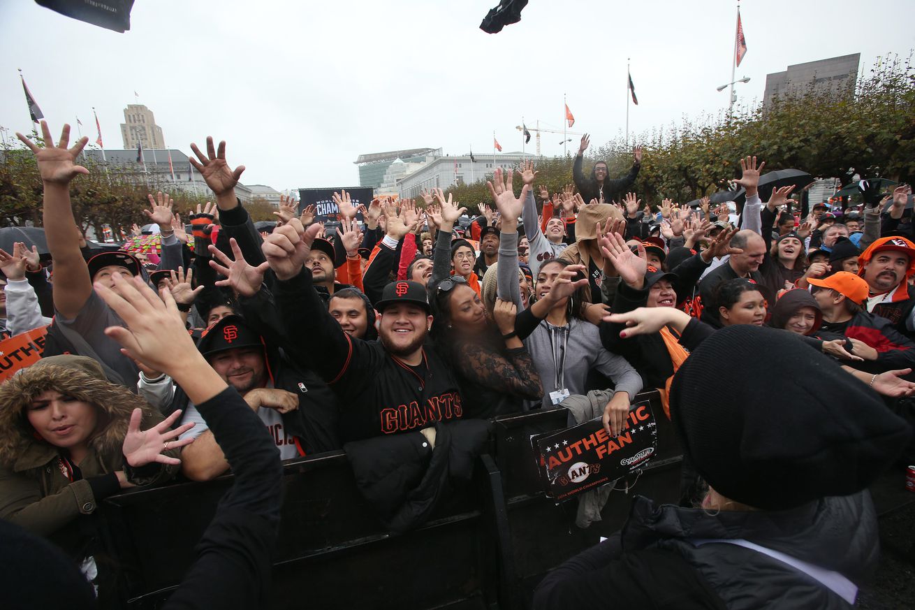 San Francisco Giants fans clamor for Mad Bum briefs handed out by Jockey employees at Civic Center Plaza during the team’s World Series celebration in San Francisco, Calif., on Friday, October 31, 2014. (Jane Tyska/Bay Area News Group)