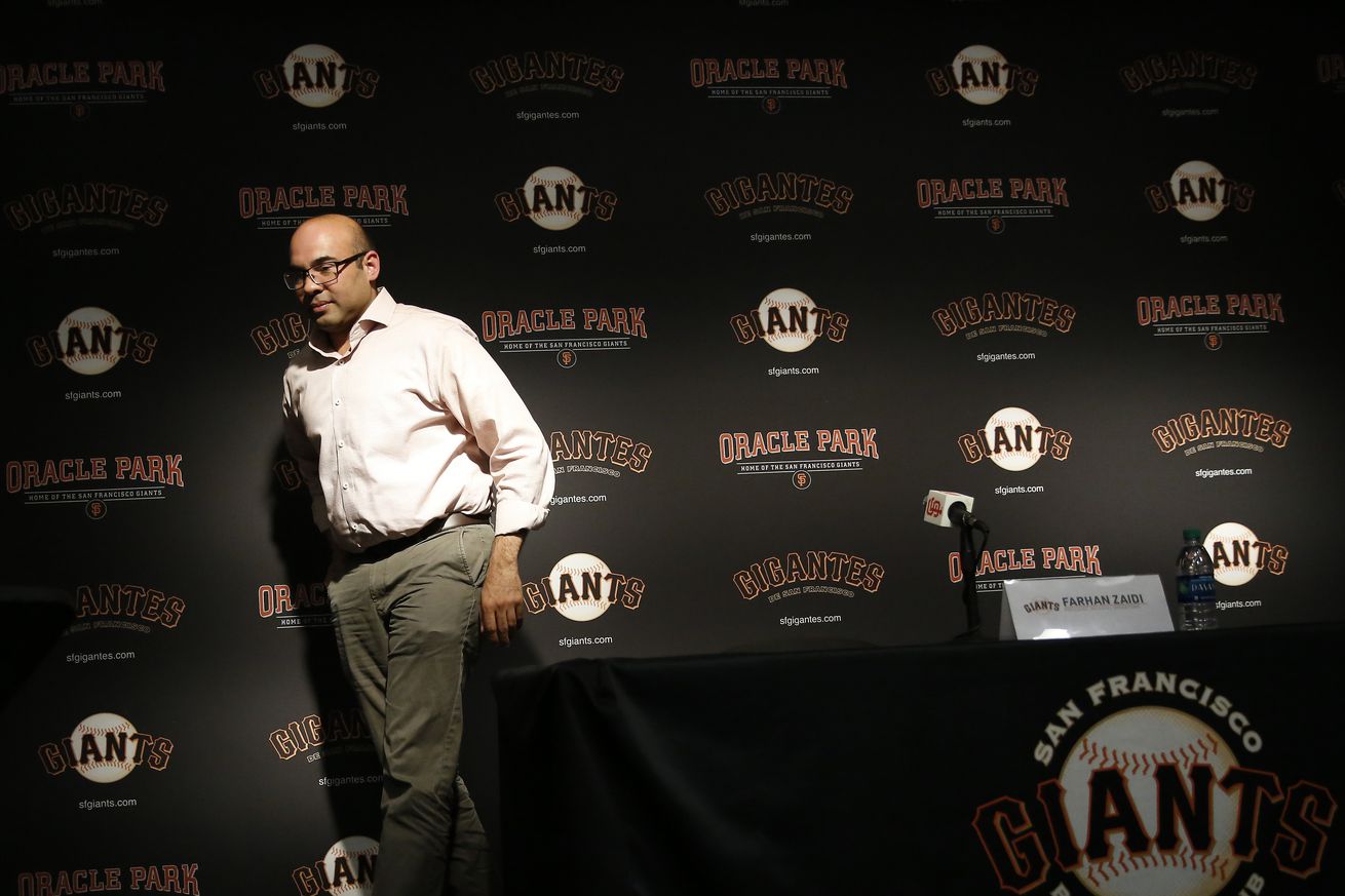 San Francisco Giants president of baseball operations Farhan Zaidi (right) leaves the dais after speaking at a news conference at Oracle Park in the Nick Peters interview room on Tuesday, October 1, 2019 in San Francisco, CA.