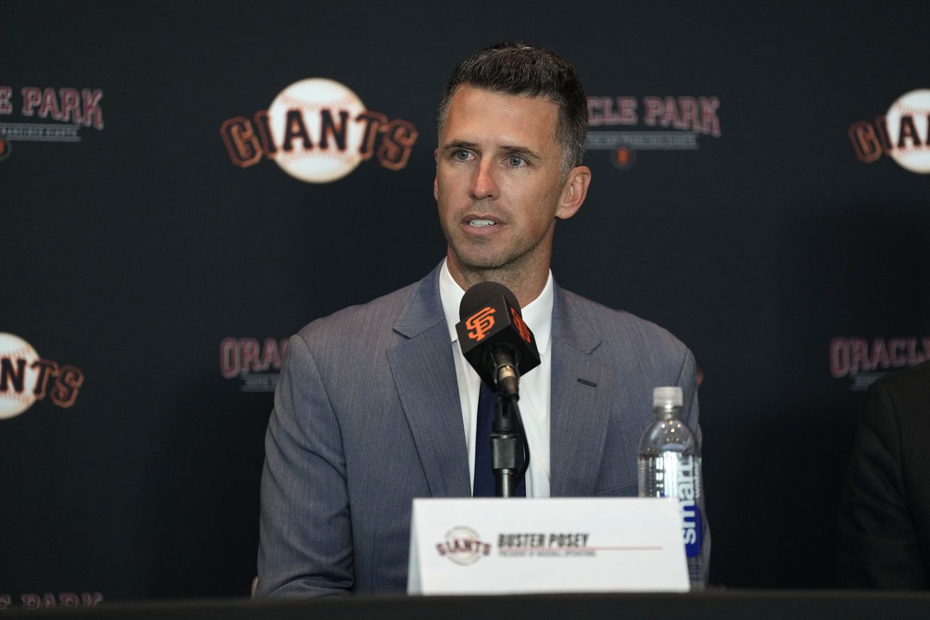 Buster Posey talking at a press conference. 