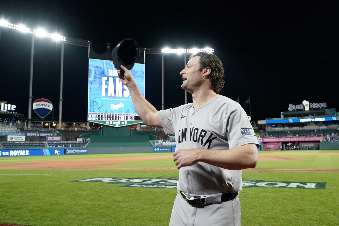 Gerrit Cole waiving his cap to the crowd. 