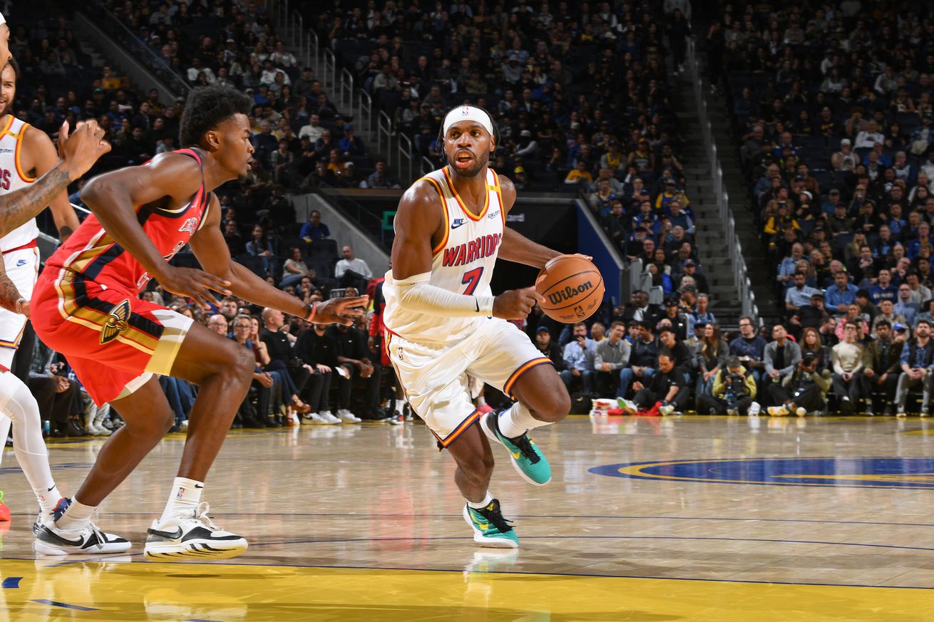 Buddy Hield dribbling with his left hand. 