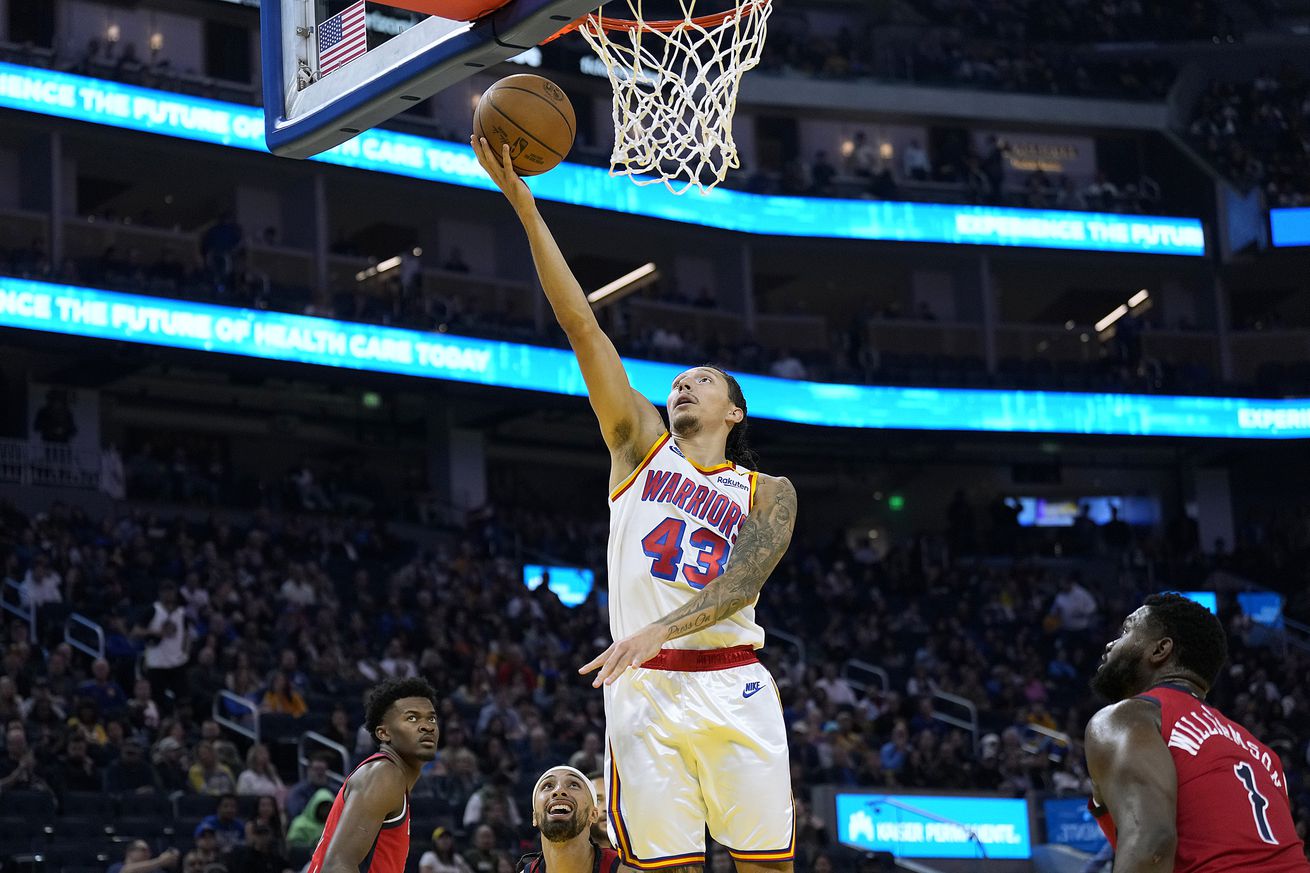 Lindy Waters III shooting an uncontested layup. 