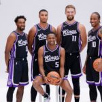 Sacramento Kings guard Malik Monk (0) and forward Keegan Murray (13) and forward Domantas Sabonis (11) and forward DeMar DeRozan (10) and guard De'Aaron Fox (5) pose for a photo during media day