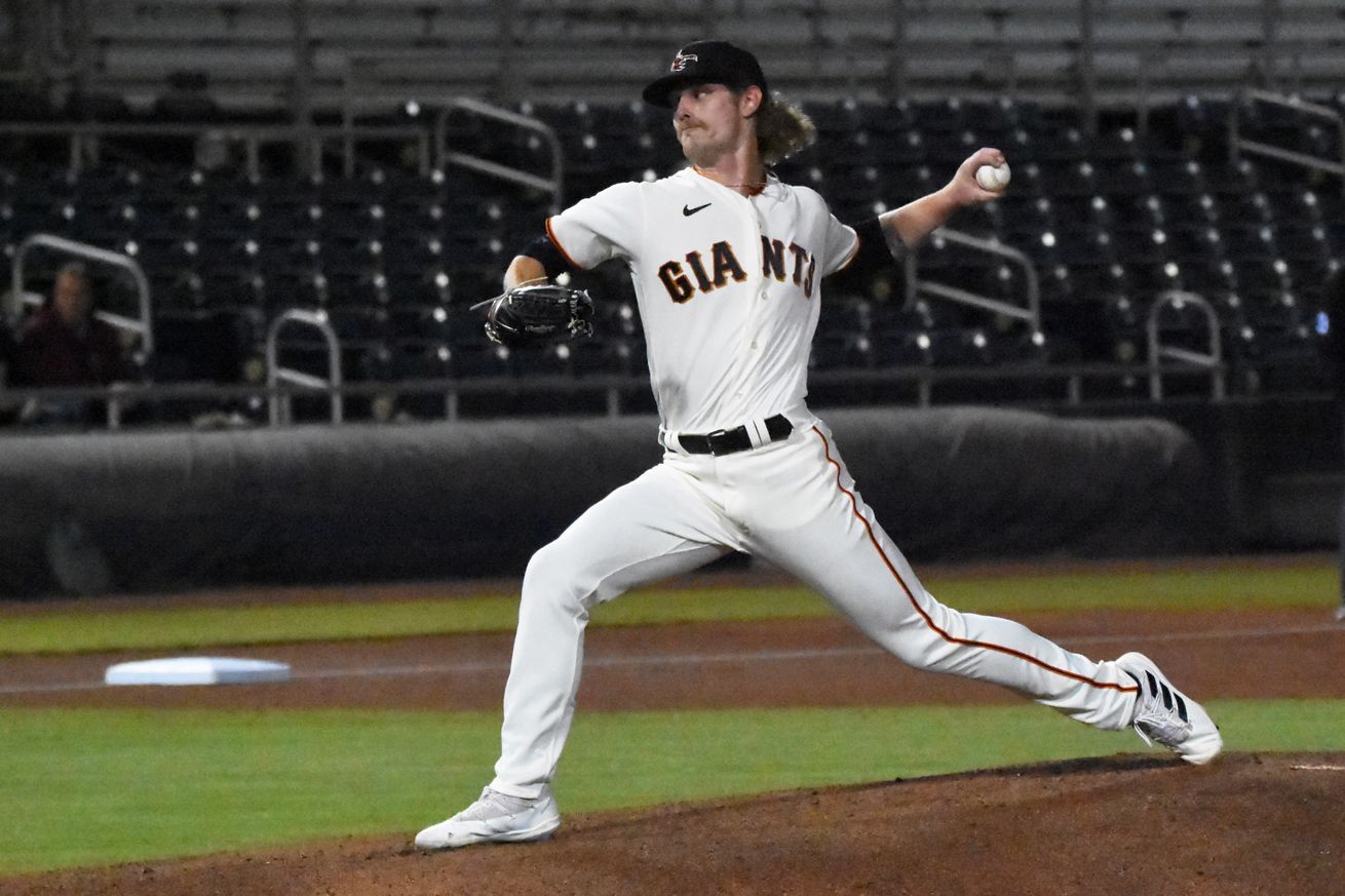 Carson Whisenhunt in stride, throwing a pitch.