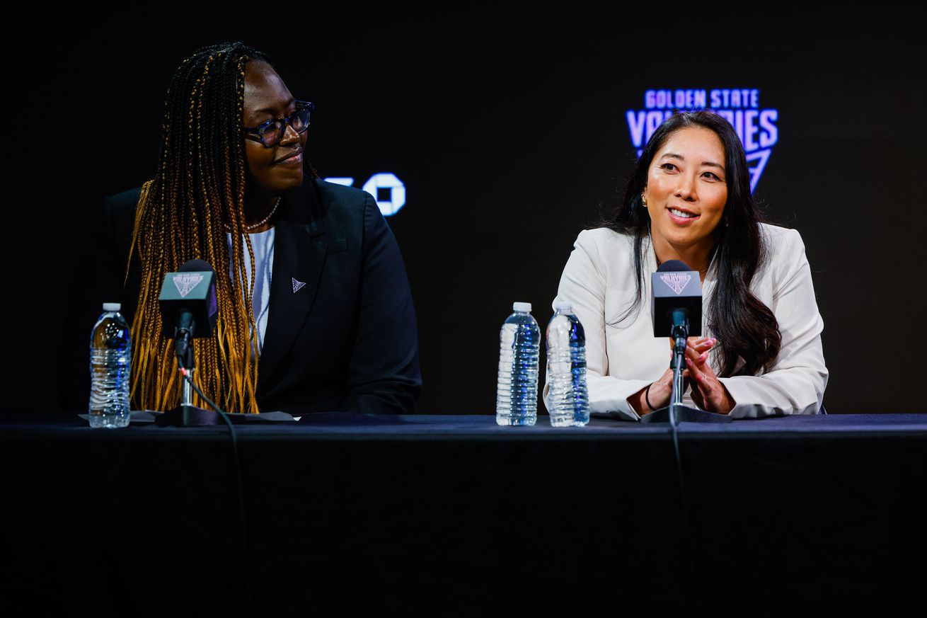 Golden State Valkyries General Manager Ohemaa Nyanin, left, announces their new head coach Natalie Nakase, formerly a first assistant coach with the 2-time WNBA Champions, the Las Vegas Aces, at Chase Center in San Francisco on Thursday, October 10, 2024.