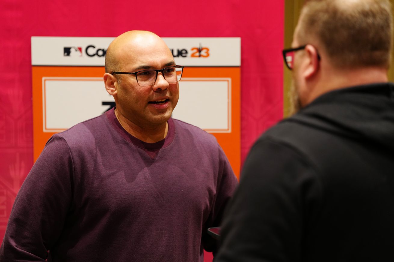 Farhan Zaidi talking with reporters at Spring Training. 