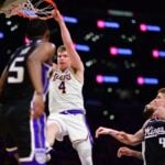 Los Angeles Lakers guard Dalton Knecht (4) dunks