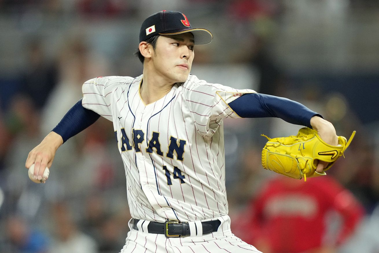 Rōki Sasaki throwing a pitch for Team Japan.