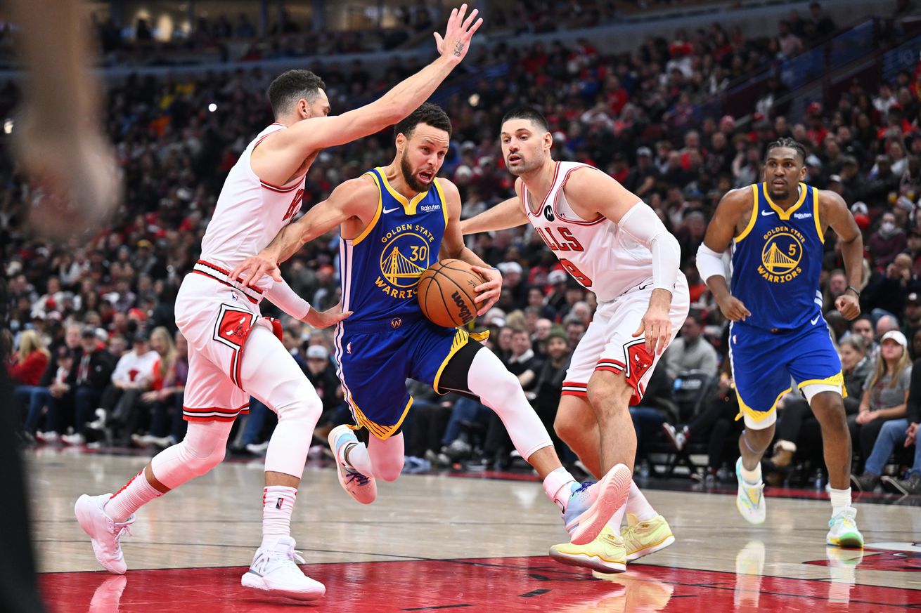 Zach LaVine, Steph Curry, Nikola Vucevic, Kevon Looney Golden State Warriors v Chicago Bulls