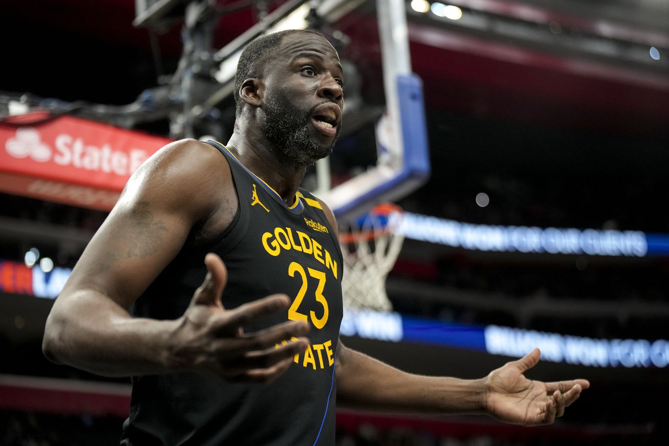 Draymond Green holding his hands out in confusion. 