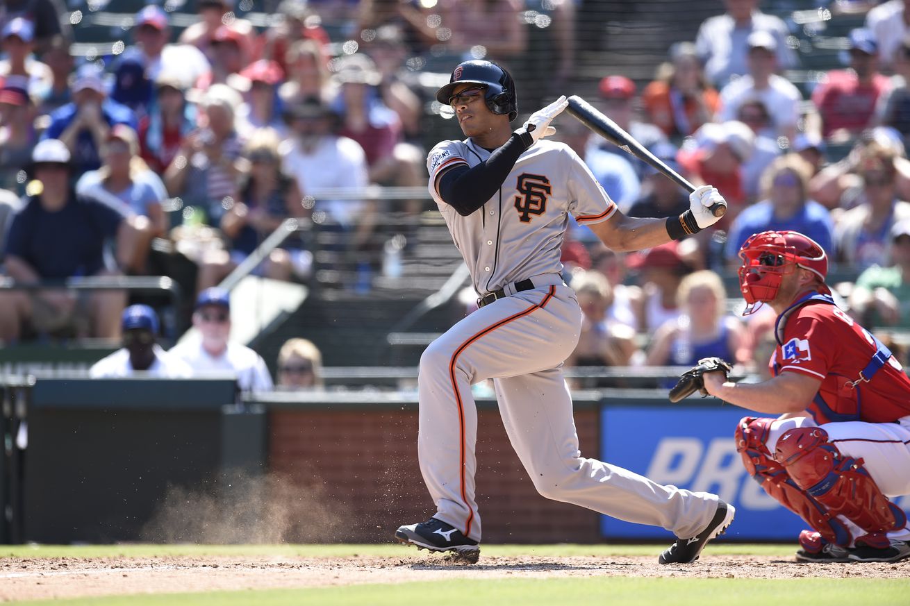 Justin Maxwell swinging the bat. 