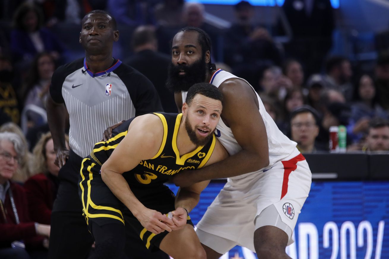 Steph Curry fighting with James Harden for position. 