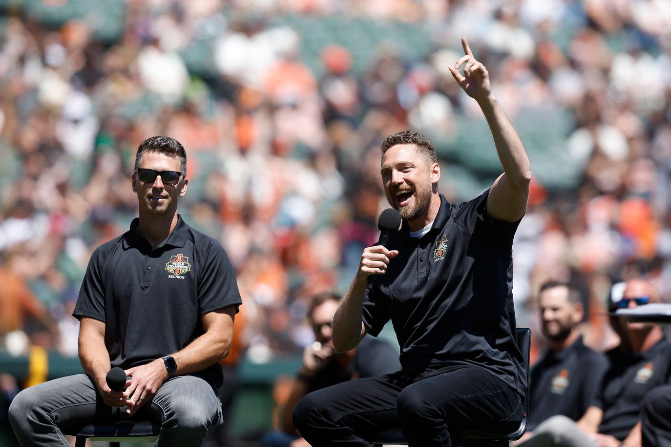 Hunter Pence and Buster Posey talking to fans.