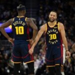 Golden State Warriors forward Jimmy Butler III (10) and guard Stephen Curry